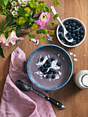 Buckweatporridge with blueberries, almond mik and cocounutflakes