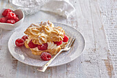 Choux pastry pinwheels with raspberries