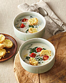 Creamy soup with cheese croutons