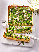 Tray quiche with green peas