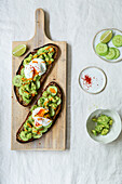Sourdough bread with cucumber-and-avocado cream and a poached egg