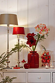 Christmas decorated chest of drawers with amaryllis