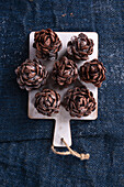 Vegan pine cones made from chocolate cake pops and chocolate cornflakes