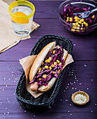 Hot-dog with red cabbage and corn