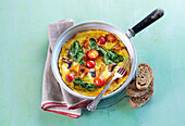 Frittata with mushrooms, tomatoes, and spinach