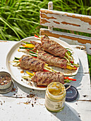 Grilled beef roulades with vegetable sticks