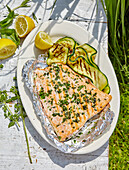 Grilled salmon in foil with grilled zucchini