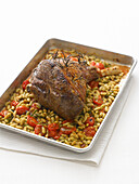 Roast lamb with flageolet beans