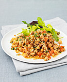 Spicy pork with chickpeas and tomatoes