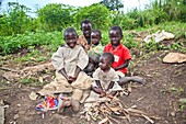 Children playing in field, Uganda