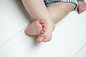 Baby's feet crossed