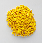 Yellow plastic granules