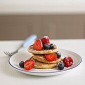 Plate of fruit and pancakes