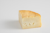 Slice of French Rollot cow's milk cheese