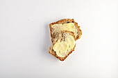 Buttered slice of banana bread