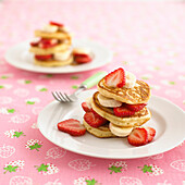 Pancakes, strawberries and syrup