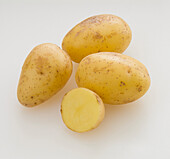 Whole and sliced 'Nicola' potatoes