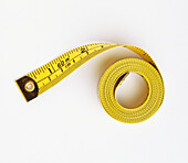 Spooled yellow tape measure