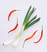 Red chilli peppers and spring onions
