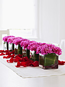 Dahlias and rose petals table decoration