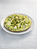 Grated courgette and goat's cheese omelette