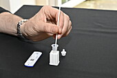 Person doing a Covid-19 self test