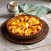Normandy pear tart with apricot and kirsch glaze