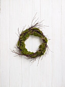 Seasonal wreath using birch twigs and carpet moss