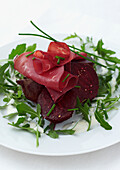Roasted beetroot with bresaola and rocket