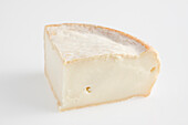 Slice of French chevrotin des aravis AOC goat's cheese