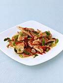 Chicken stir-fried with spring onion, basil and lemongrass