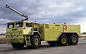 Green airport fire truck showing monitor with moveable arm