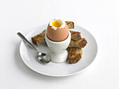 Boiled egg with wholemeal toast soldiers