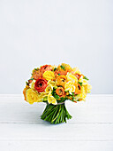 Orange and yellow hand tie bouquet