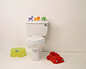 Toilet with toys, footstool and potty