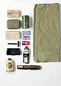 World War Two US paratroopers grooming equipment