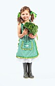 Girl holding cabbage
