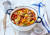 Pork stew with beans and apricots