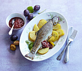Trout with plum puree