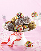 Rum balls with coconut, with gingerbread crumbs and with sugar sprinkles