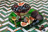 Pudding with blueberries, grapes and figs