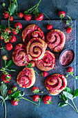 Strawberry yeast cakes with freeze dried strawberry powdered sugar coating