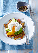 Sweet potato pancakes with avocado and poched egg