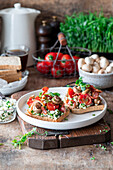 Breakfast toasts with cottage cheese, bacon, roasted mushrooms and tomatoes