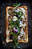 Artichoke and ricotta cake with baby salad