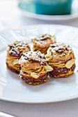 Choux pastry with cream filling and pistachios