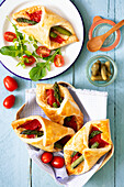 Parmesan puff pastry filled with green asparagus and roasted peppers
