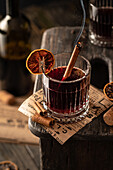 Mulled wine with smoking cinnamon stick