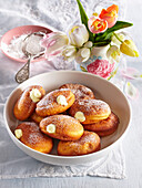 Easter doughnuts with vanilla cream and cinnamon