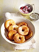 Apple fritters with berry dip